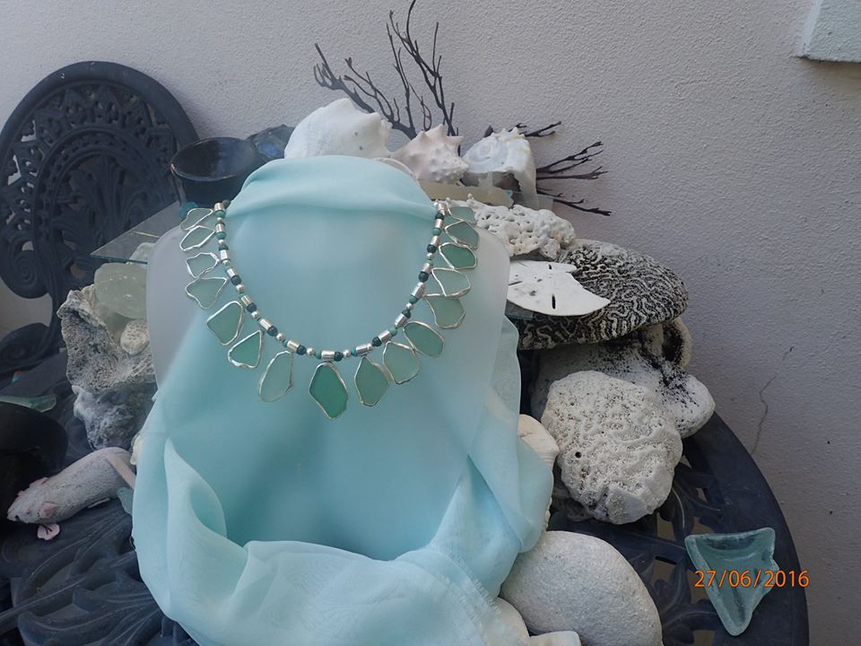 A stunning one of a kind seaglass collar with beautiful Abaco waters colours separated with pearls now instead of jade and turquoise.